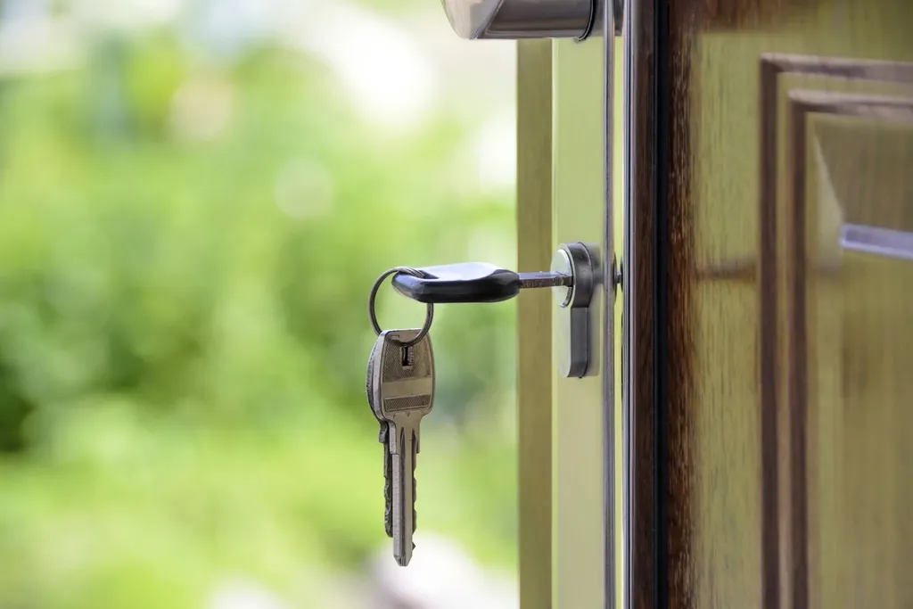 Bunch of keys inserted in a door lock