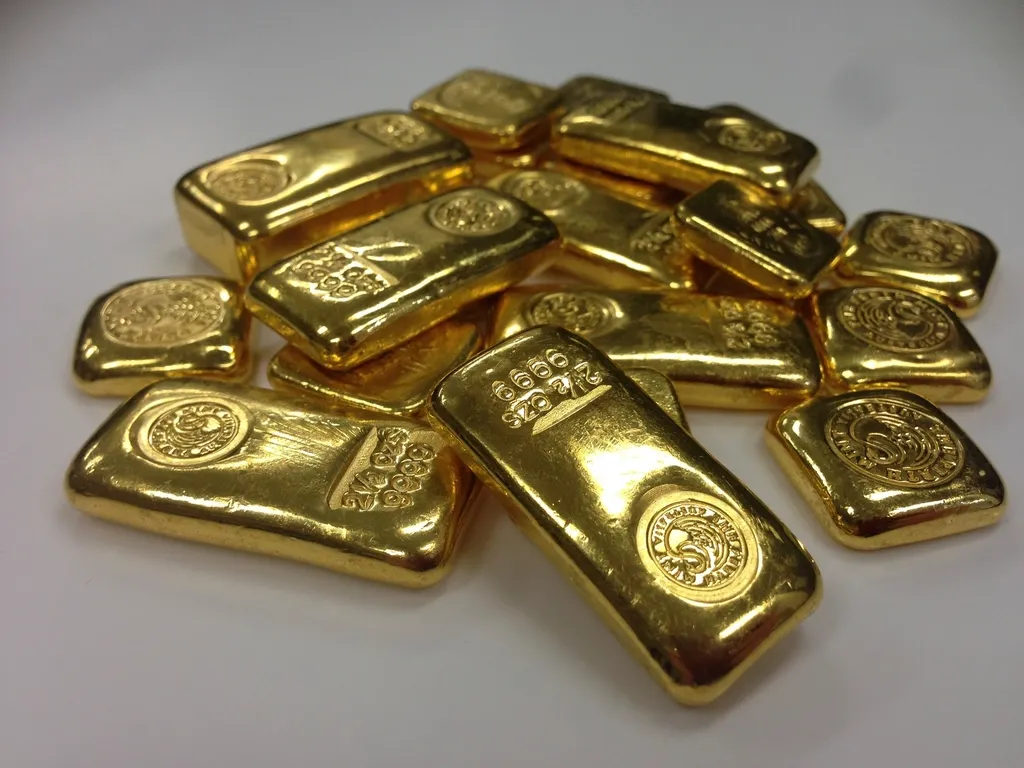 Raw gold nuggets scattered loosely