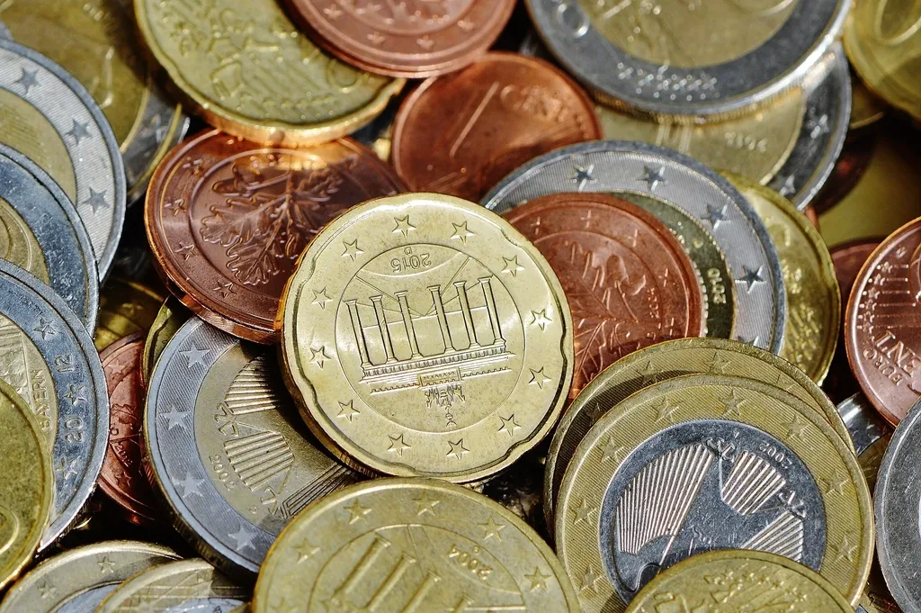 Euro coins spread out loosely